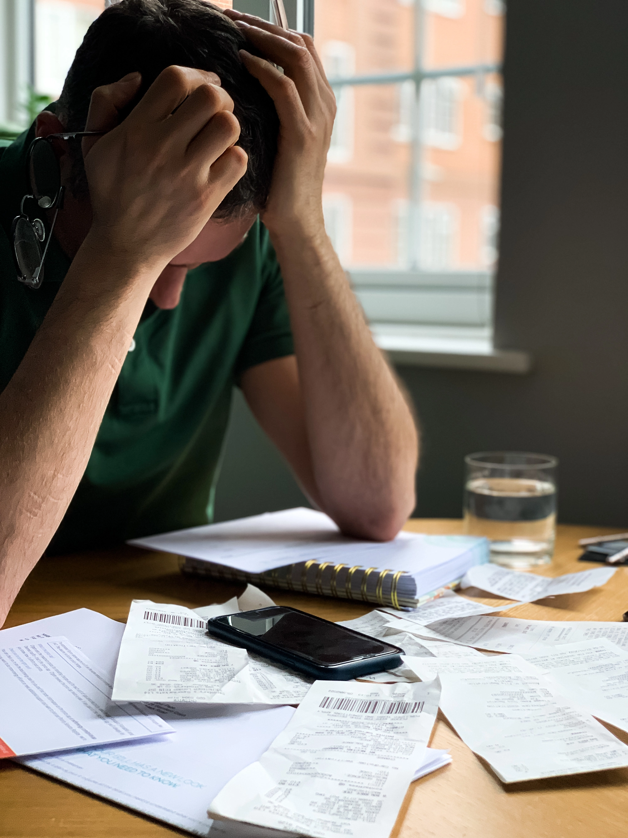 person stressed about money